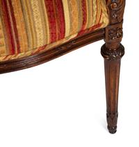 Four Louis XVI Style Carved Walnut Chairs