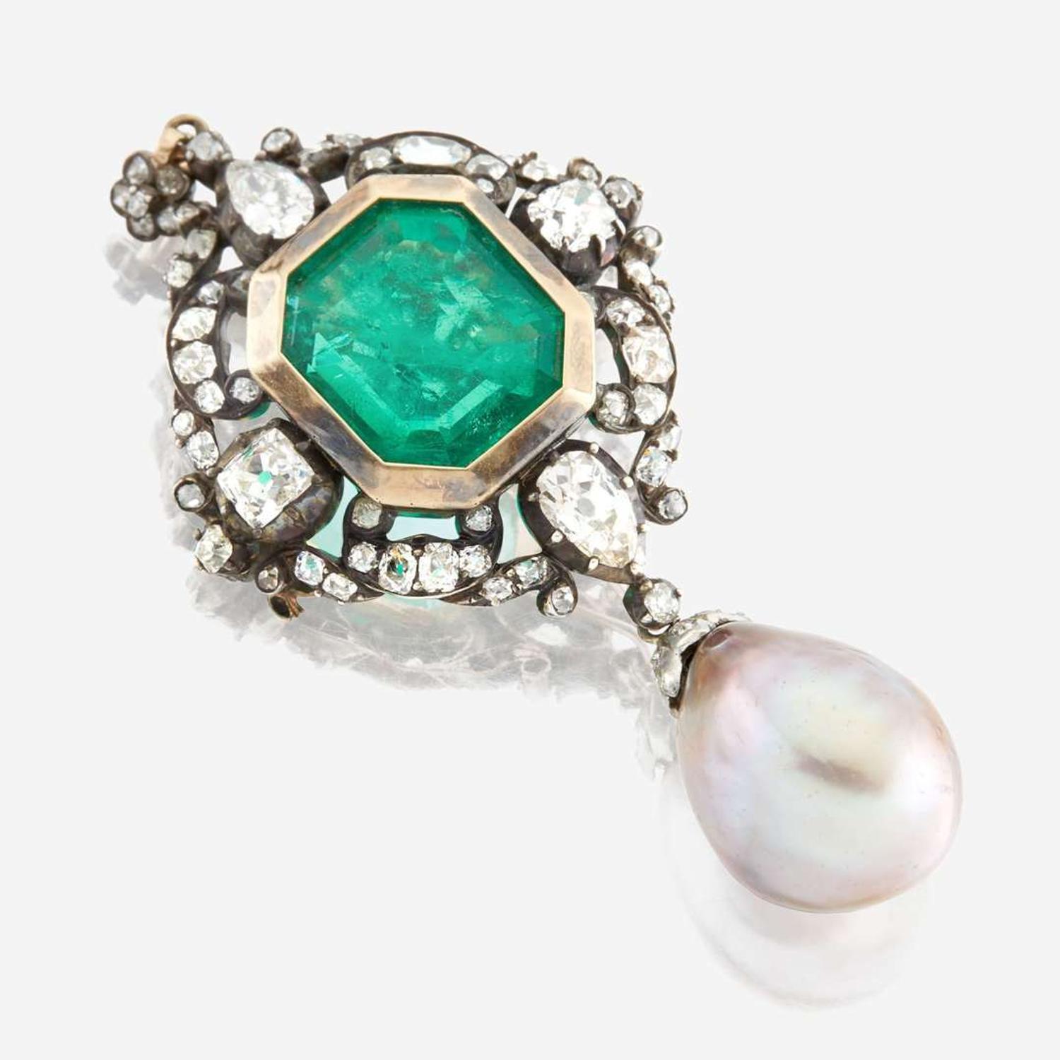 A Victorian emerald, diamond, pearl, and silver topped gold pendant/brooch