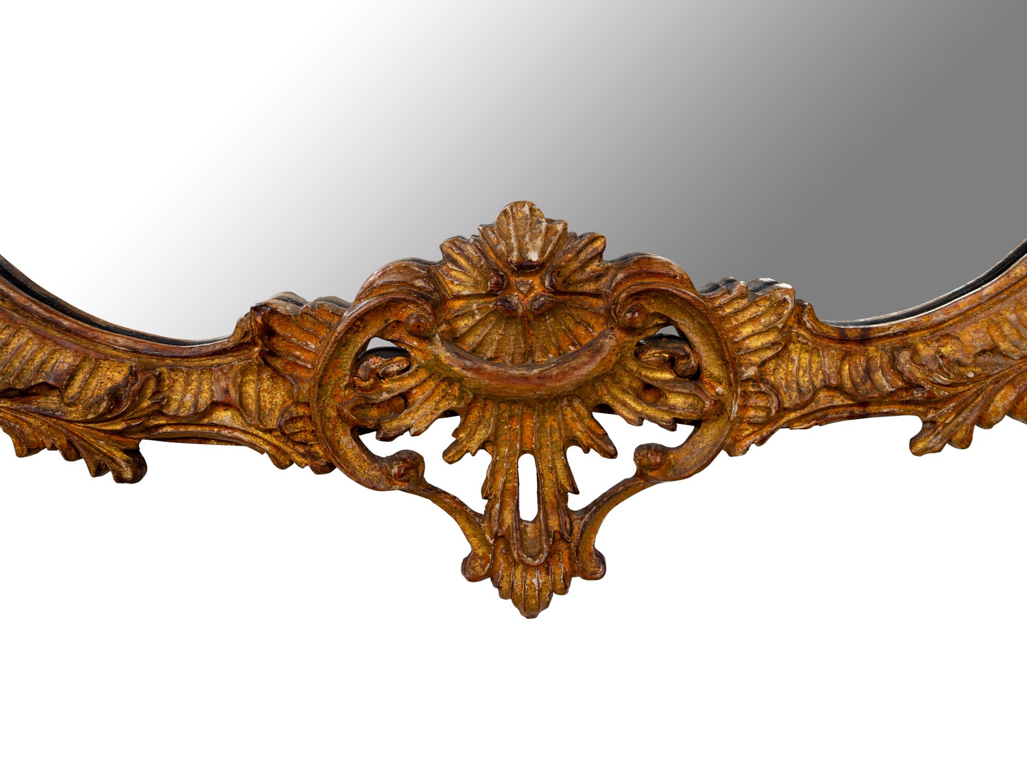 A George II Style Carved and Distressed Gilt Wood Mirror — 19TH CENTURY