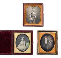 [EARLY PHOTOGRAPHY] 6 daguerreotype portraits of children with hats, incl. 2 images of the same girl