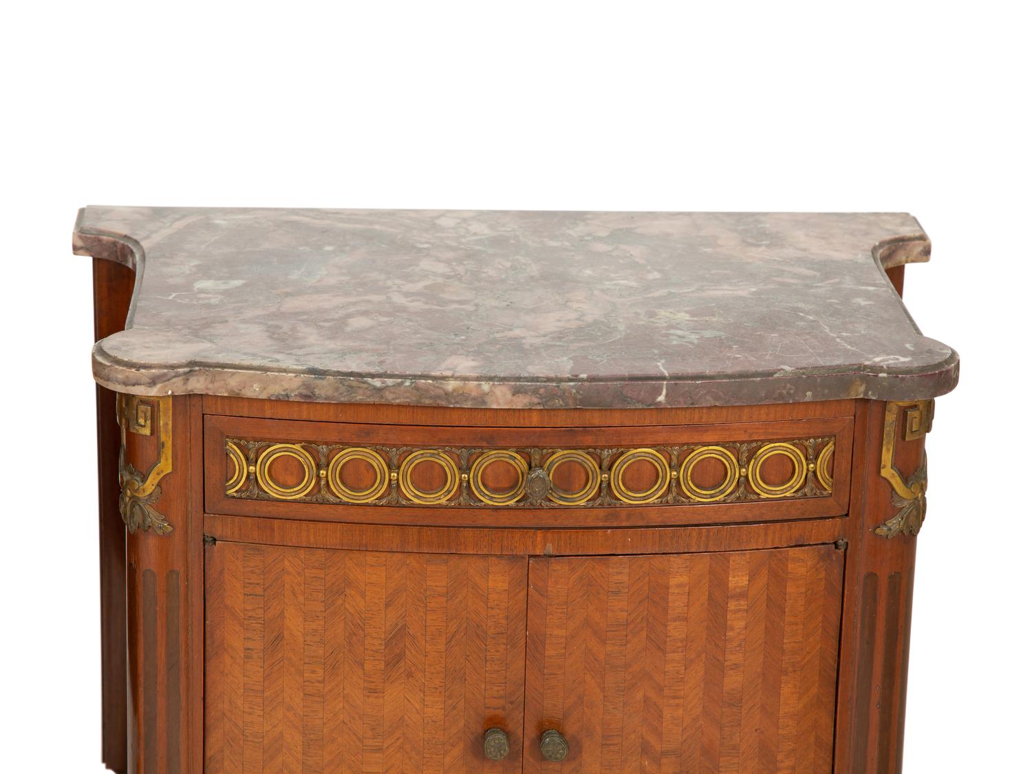 A Pair of Italian Gilt Metal Mounted Fruitwood Commodini with Marble Tops