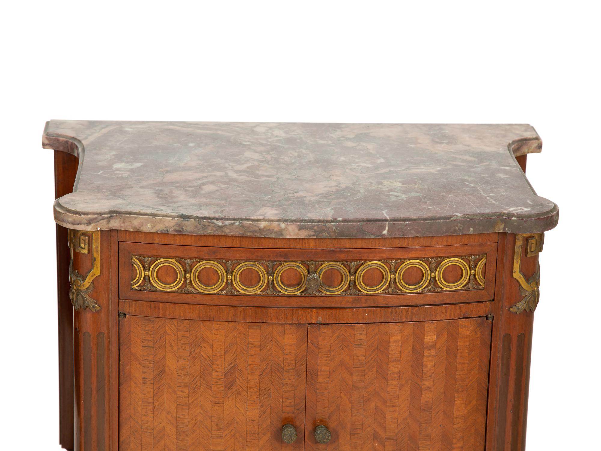 A Pair of Italian Gilt Metal Mounted Fruitwood Commodini with Marble Tops