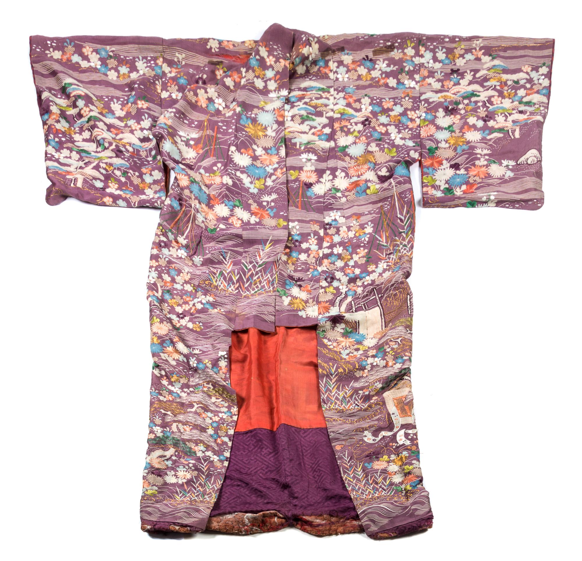 A Japanese Embroidered Silk Kimono. Height 62 inches.