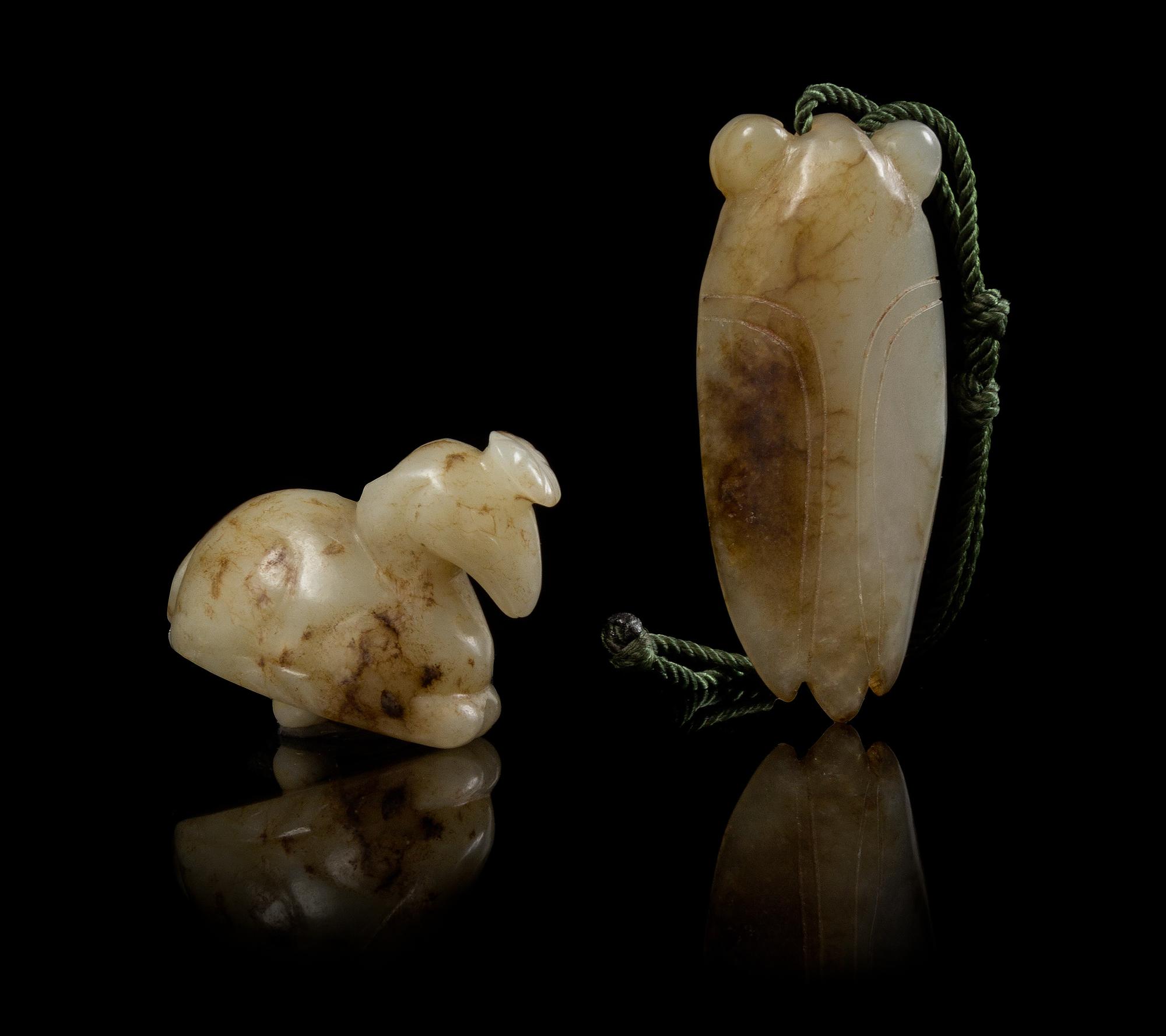 Two Carved Jade Pendants Length of first 2 1/2 inches.