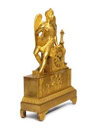 An Empire Gilt Bronze Figural Mantel Clock