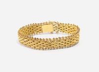 An 18K Yellow Gold Russian Bracelet
