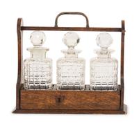 An English Oak and Cut Glass Tantalus