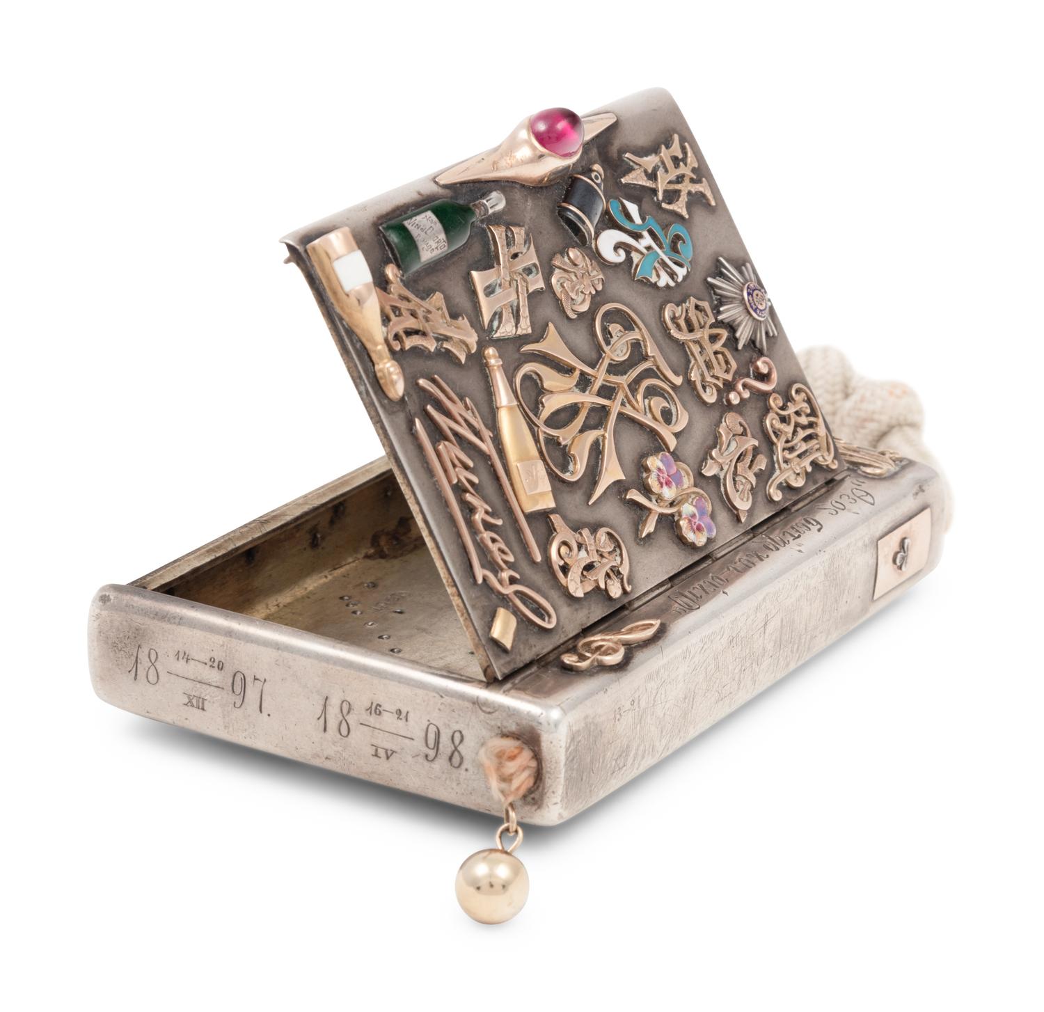 A Russian Silver and Applied Gold and Enamel Charm Decorated Cigarette Case