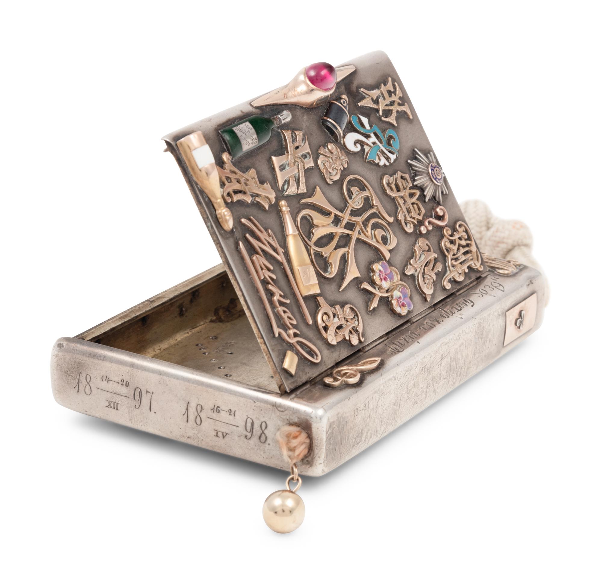 A Russian Silver and Applied Gold and Enamel Charm Decorated Cigarette Case