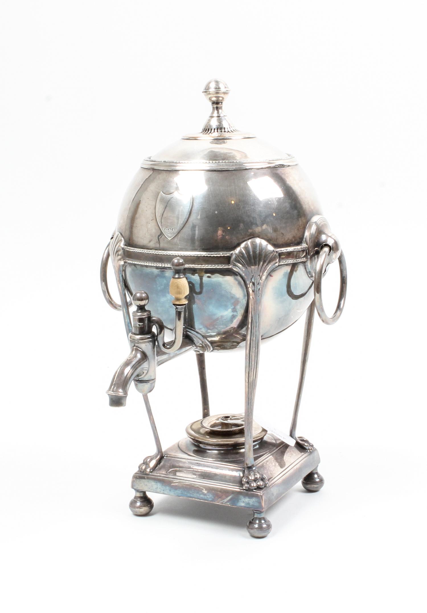 An English Silver-Plate and Silver Mounted Tea Urn, , the globular body with an applied silver shield cartouche marked for Edward Chawn