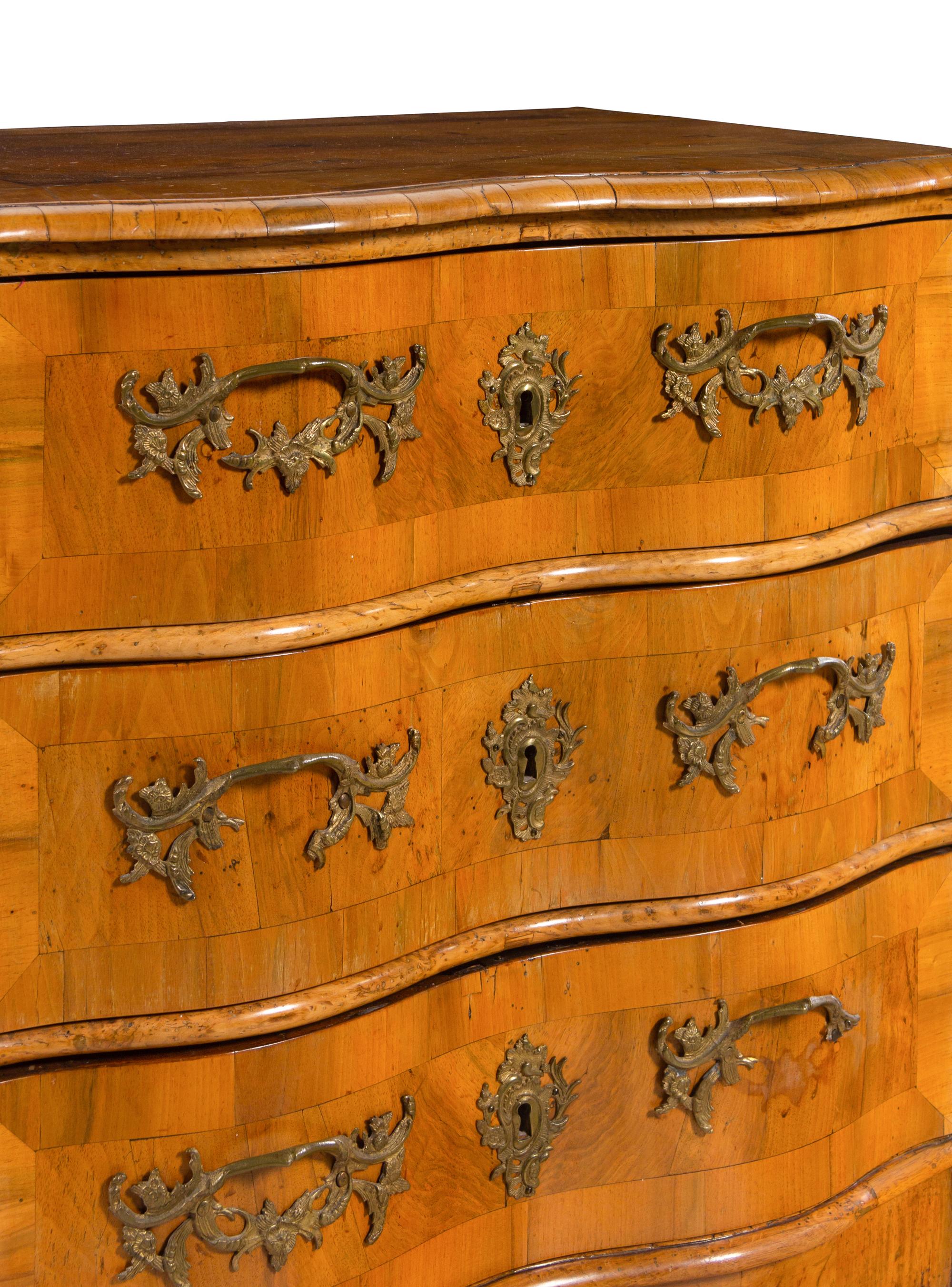 A German or Austrian Burl Walnut Commode