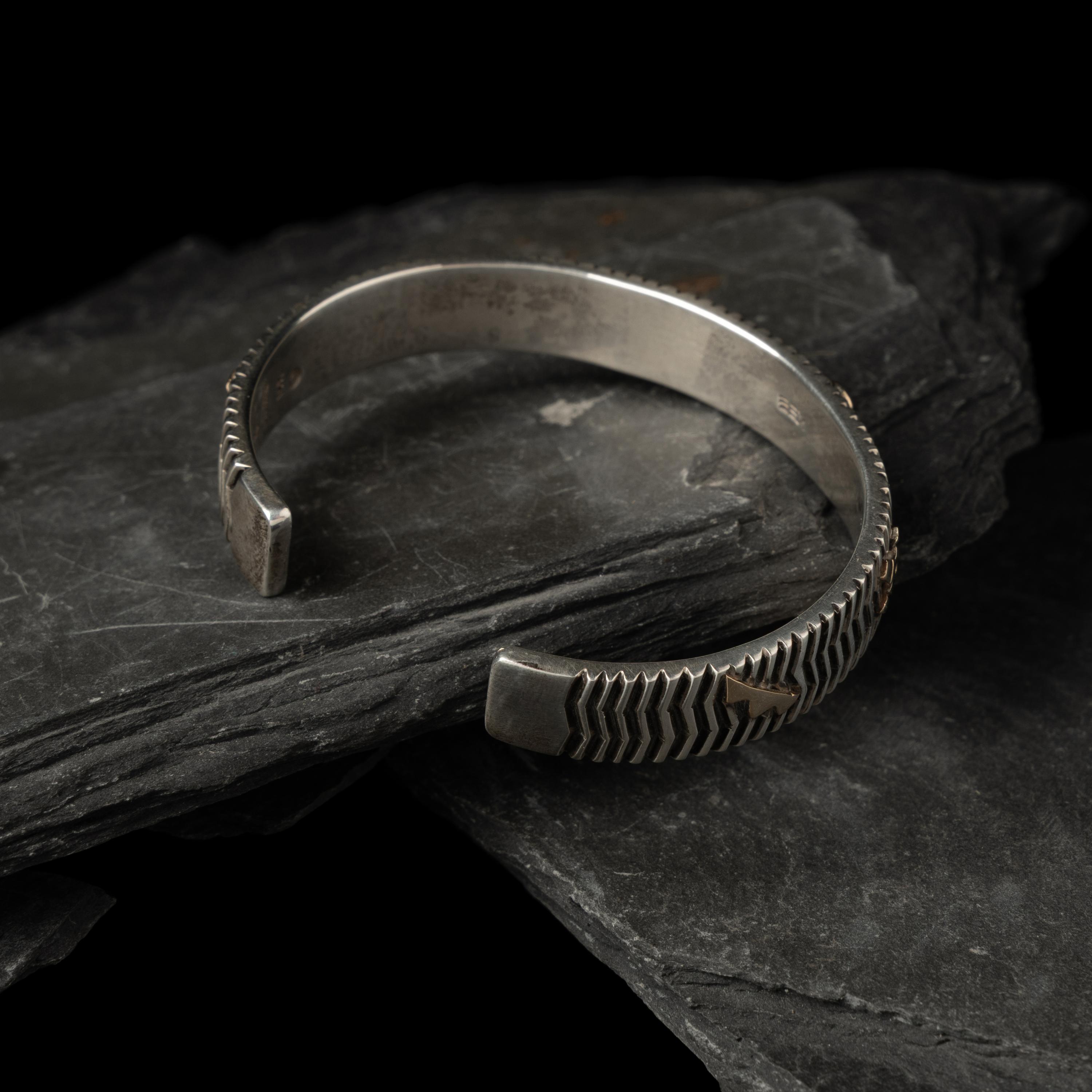 Kee Yazzie (Diné, b. 1969) — Sterling Silver and 14K Gold Petroglyph Cuff Bracelet