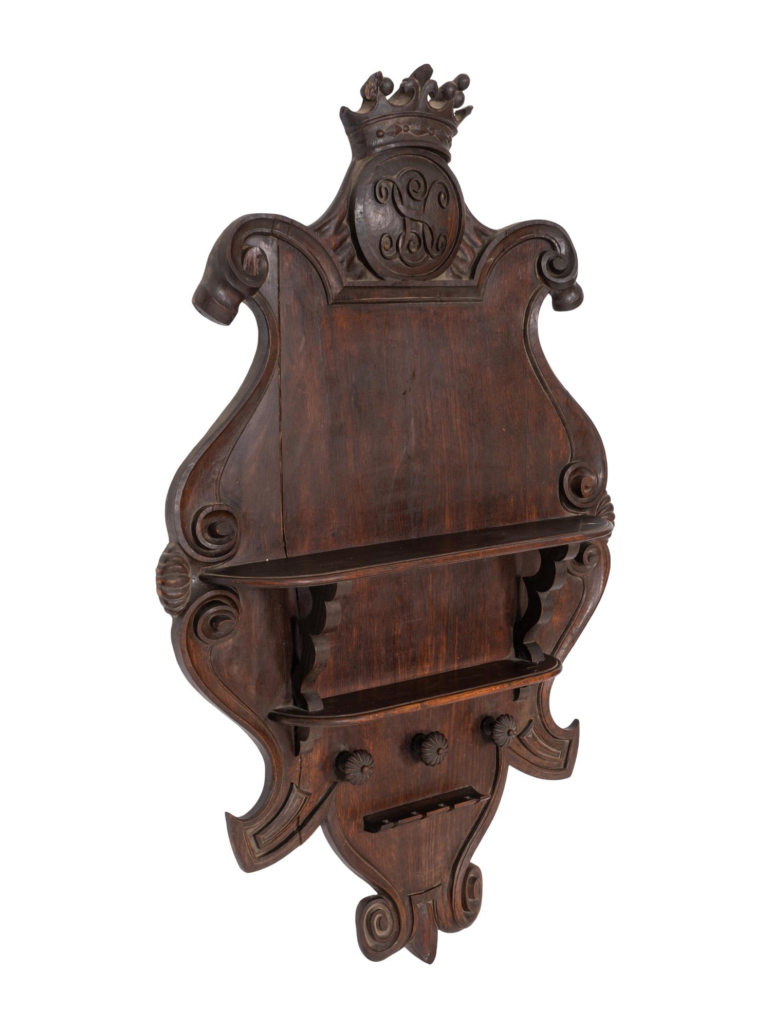 A Pair of Large Continental Cartouche-Form Hunting Lodge Pipe Racks