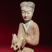 A Pair of Chinese Painted Grey Pottery Ladies with Owls, Han Dynasty — 漢 灰陶彩繪持鷹女俑一對
