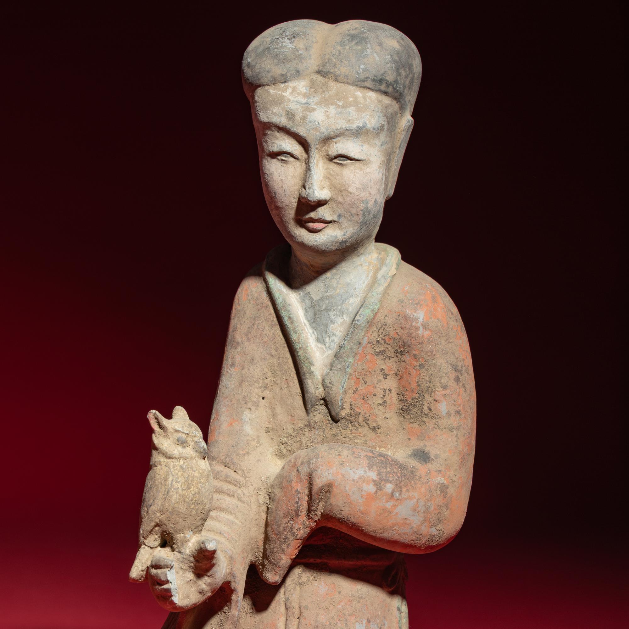 A Pair of Chinese Painted Grey Pottery Ladies with Owls, Han Dynasty — 漢 灰陶彩繪持鷹女俑一對