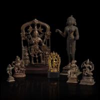 A group of seven assorted Indian and Himalayan bronzes 印度及喜马拉雅铜佛造像一组七件 17th/18th century and later ??????????