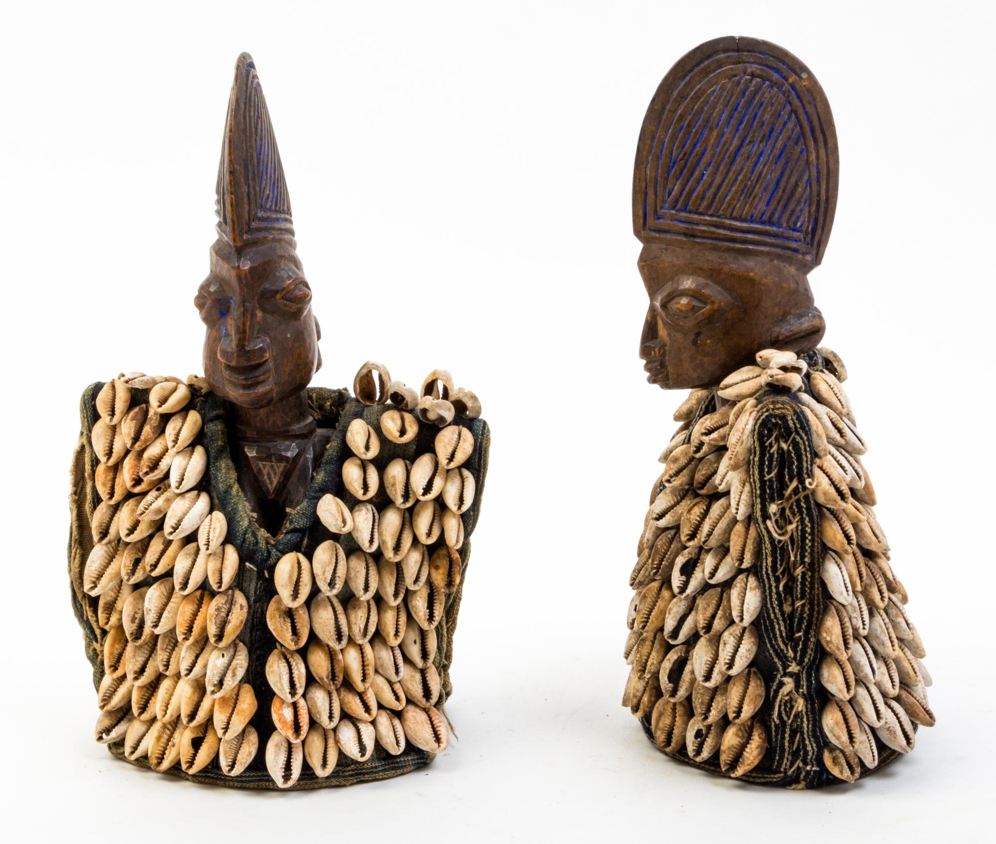 A Pair of Figural Finials Height 11 1/4 inches.