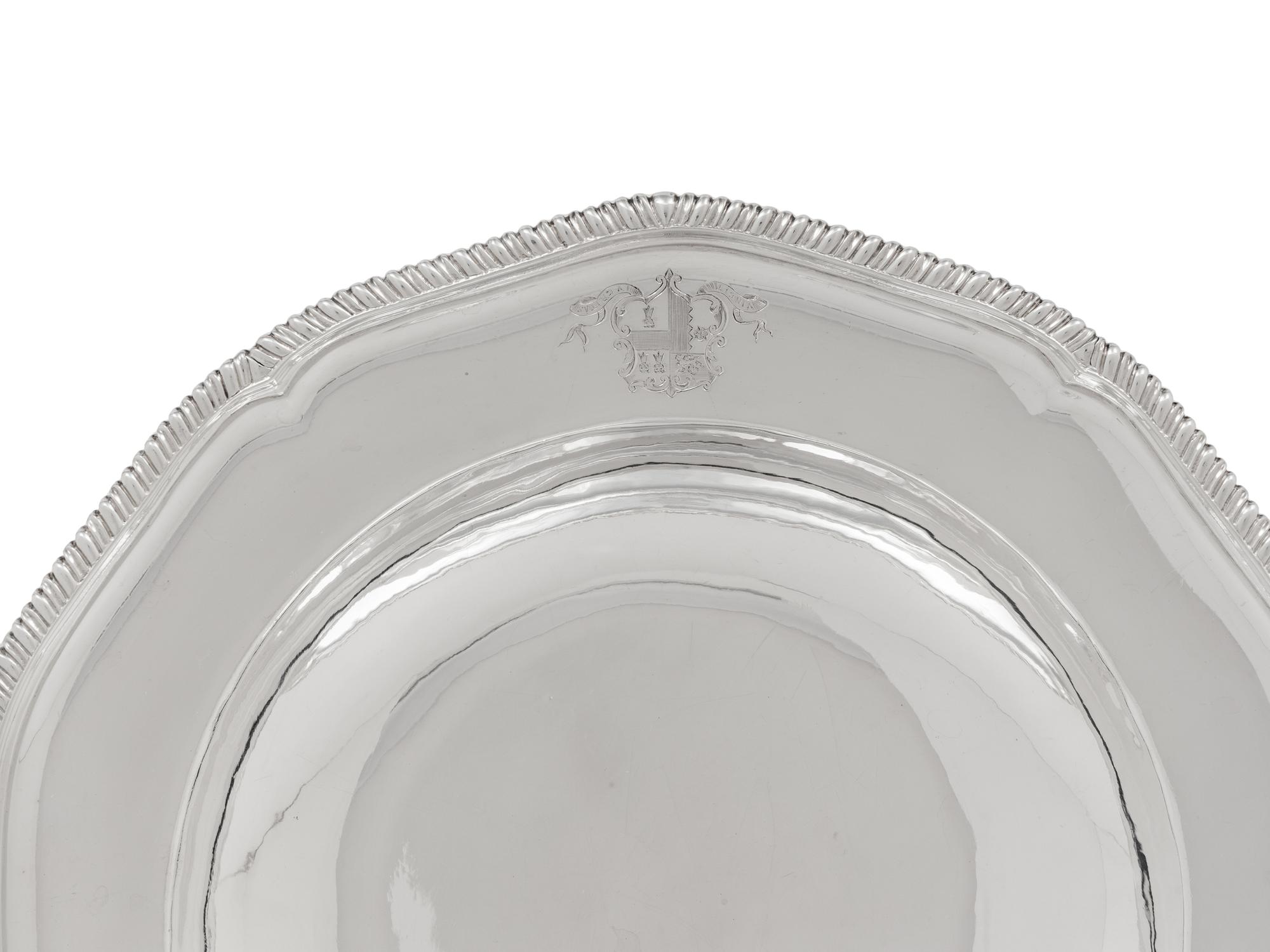 A Set of Four George III Silver Soup Plates