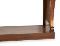 A Regency Style Mahogany and Parcel Gilt Console Table with Black Marble Top