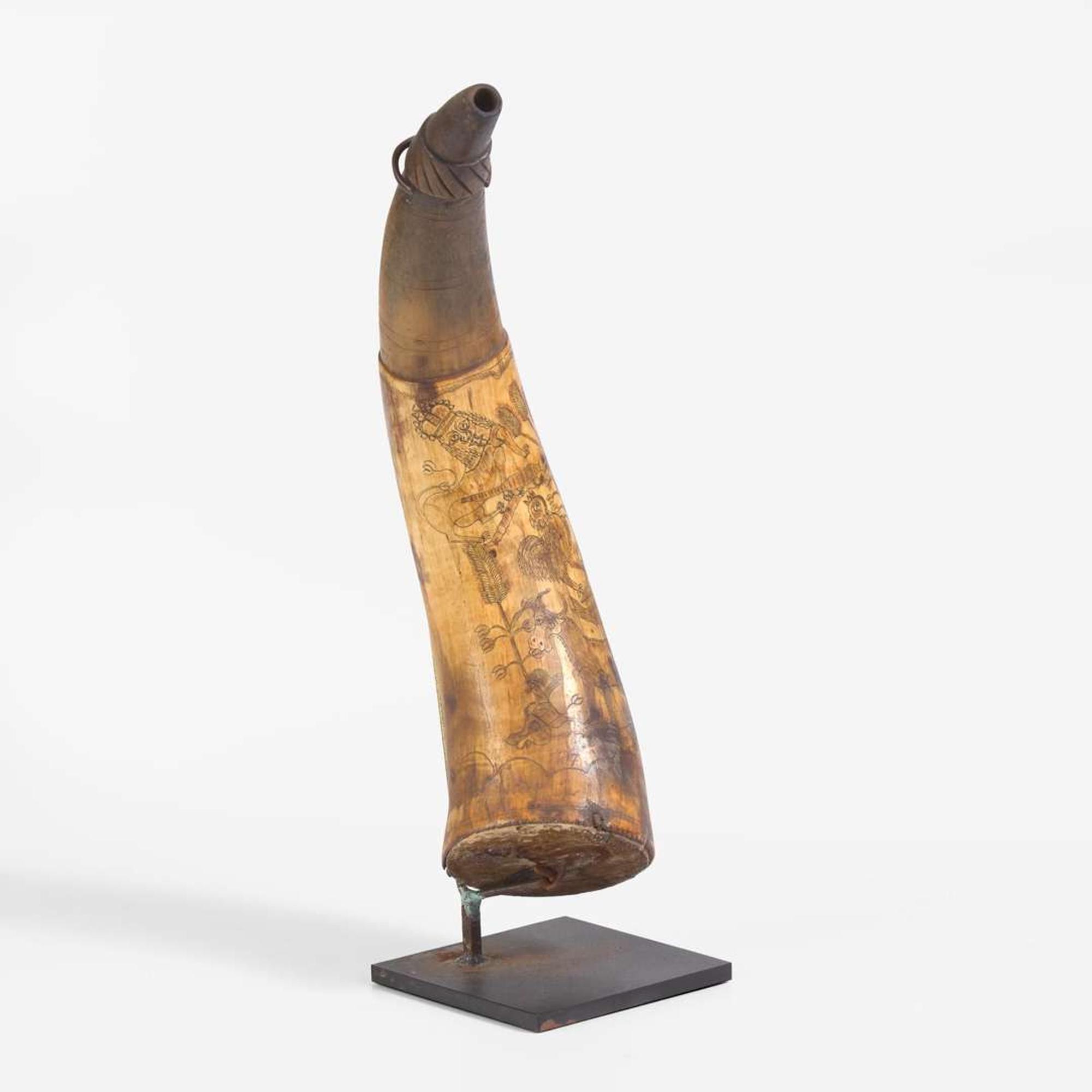 A carved and incised powder horn Pennsylvania, dated "1787"