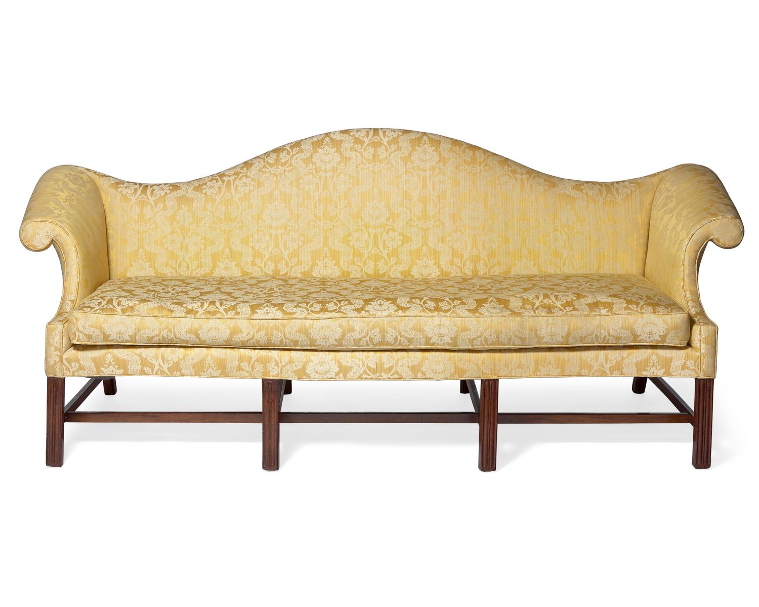 A Chippendale Mahogany Eight-Leg Camelback Sofa
