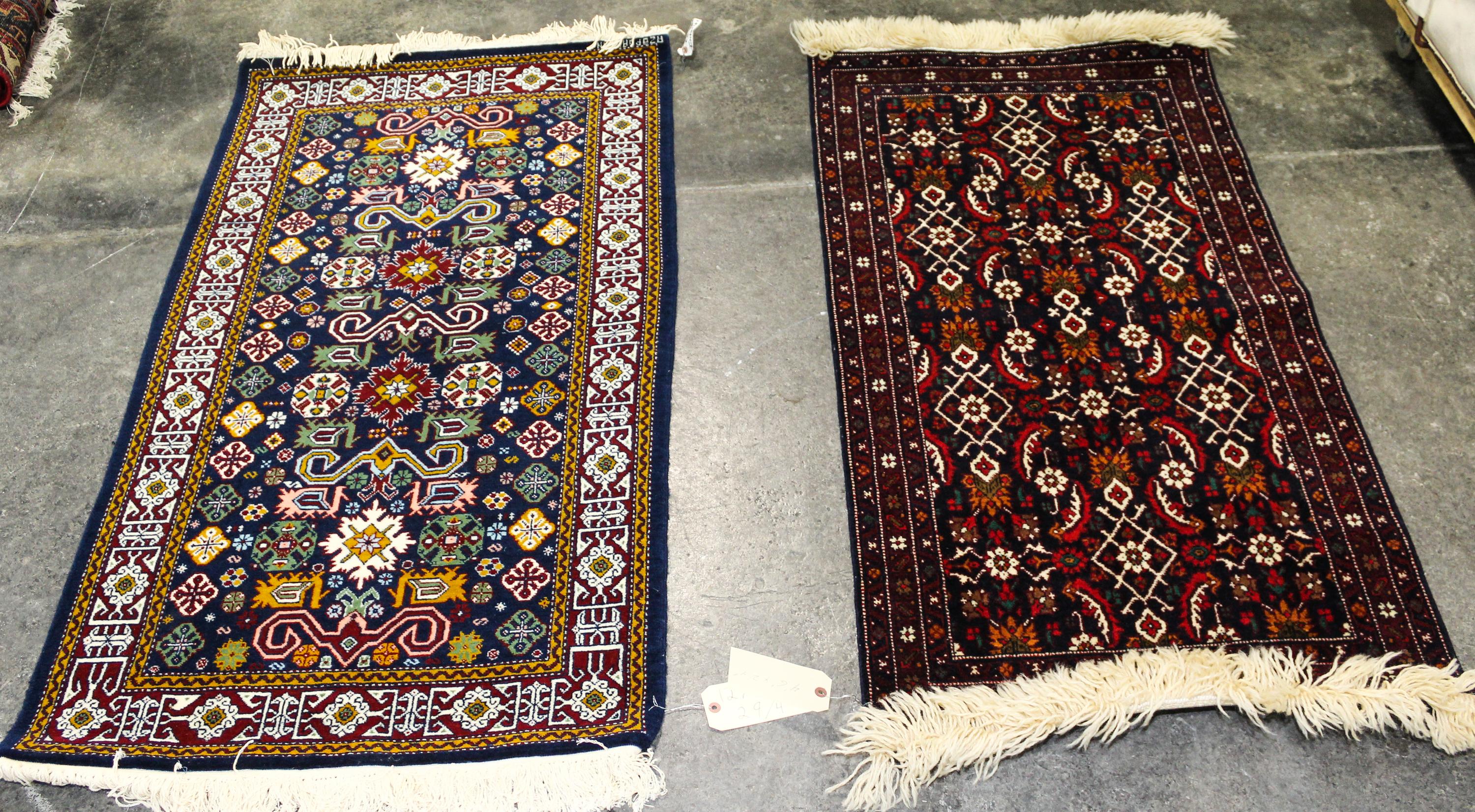 Four Wool Rugs Dimensions of largest 4 feet 6 inches x 2 feet 4 inches.
