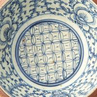 A Set of Eight Chinese Export Brown Glazed and Blue and White Bowls