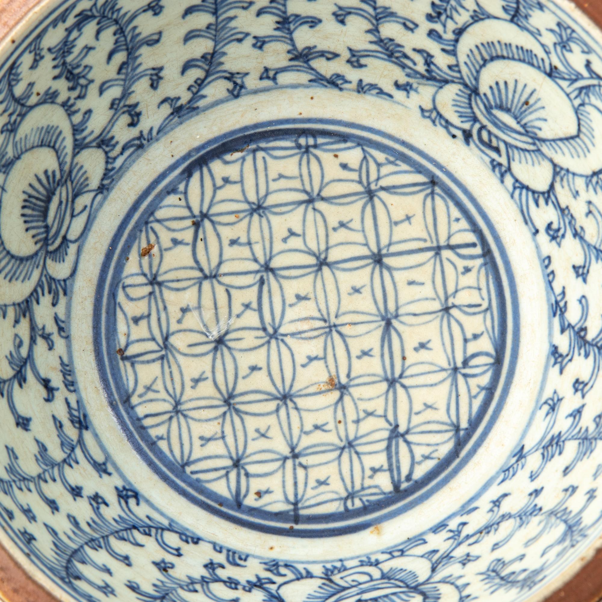 A Set of Eight Chinese Export Brown Glazed and Blue and White Bowls