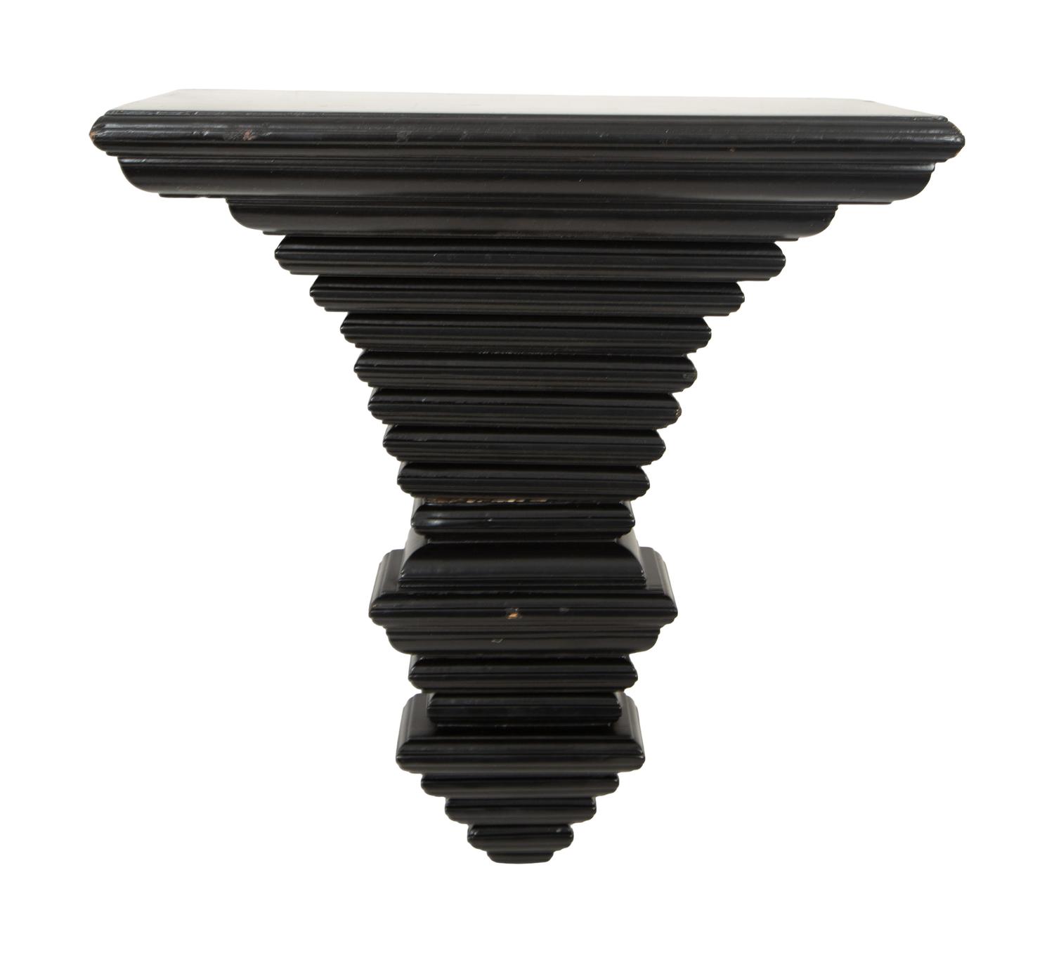 A Pair of Ebonized Wall Brackets