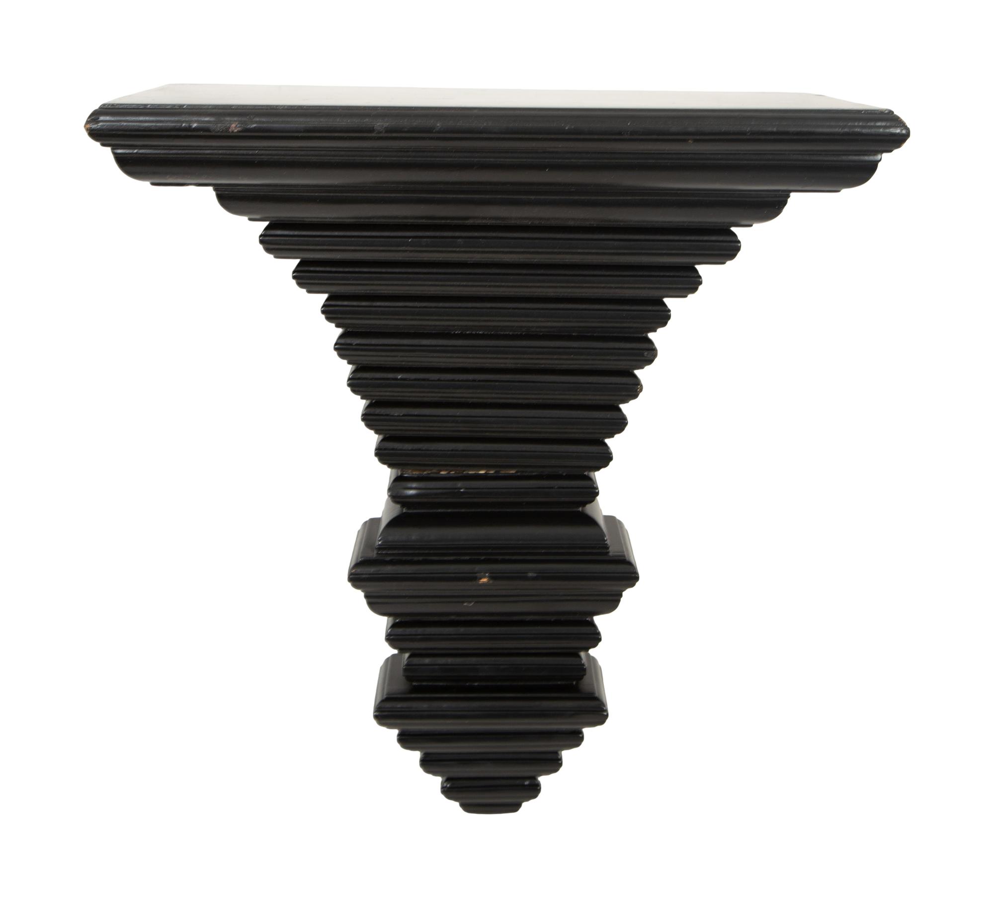 A Pair of Ebonized Wall Brackets