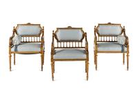 A Set of Three Napoleon III Style Giltwood Armchairs