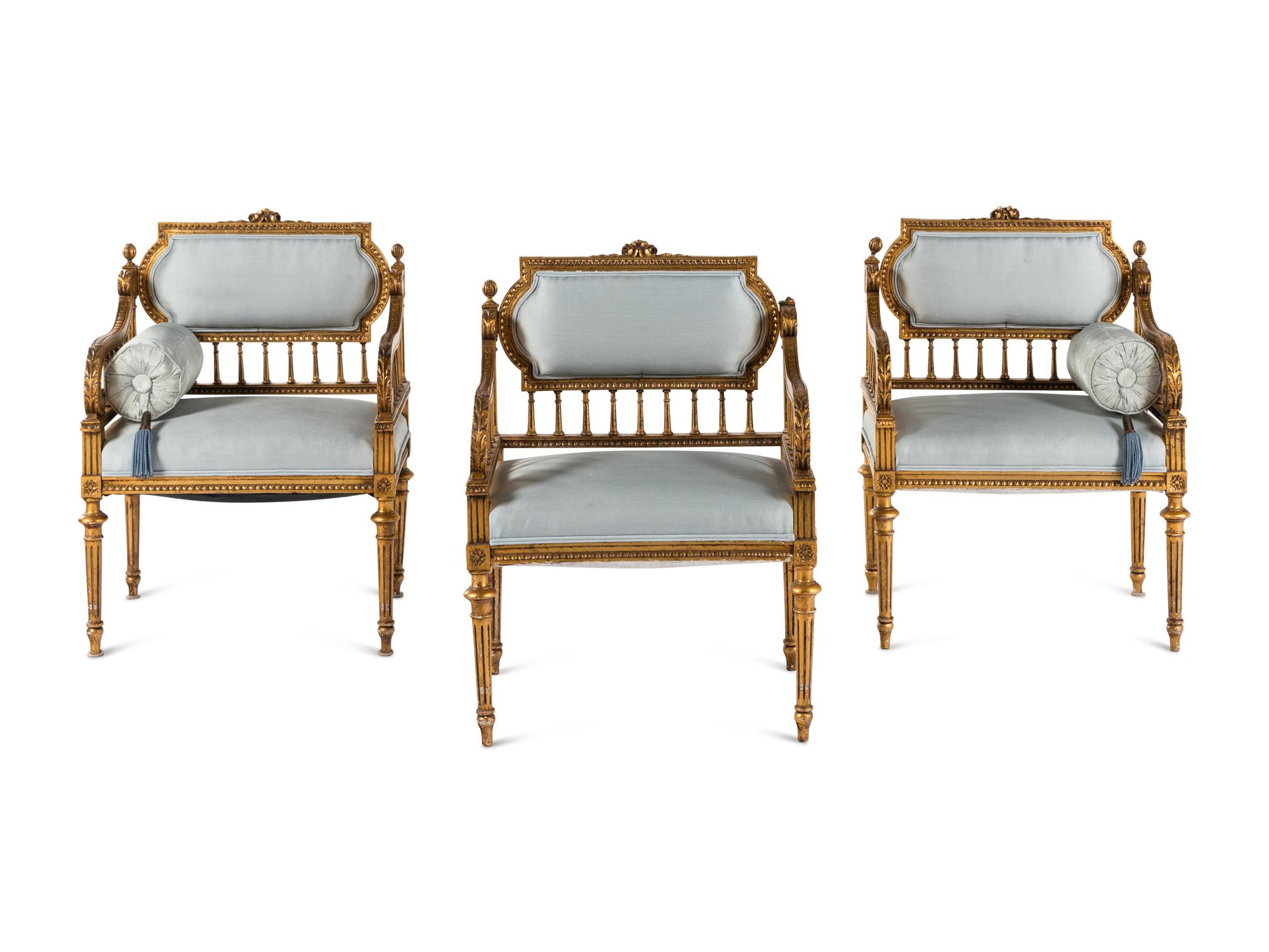 A Set of Three Napoleon III Style Giltwood Armchairs