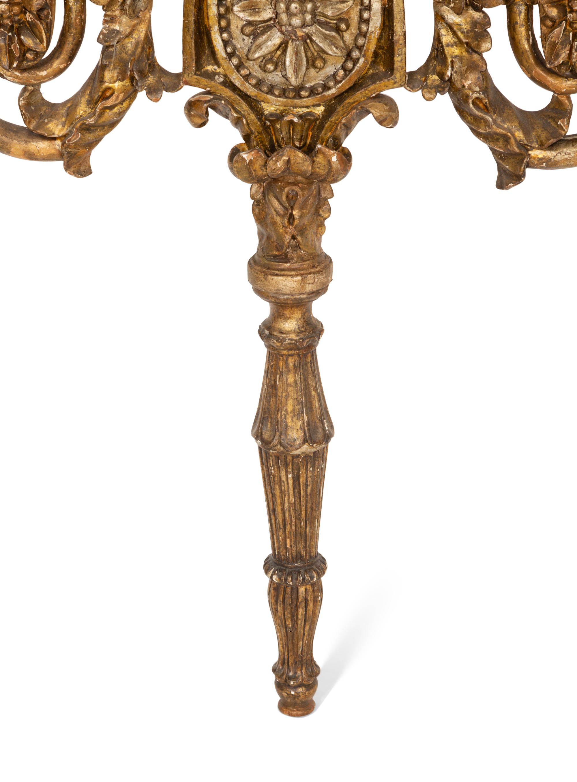 An Italian Carved Giltwood Faux Marble-Top Console Table