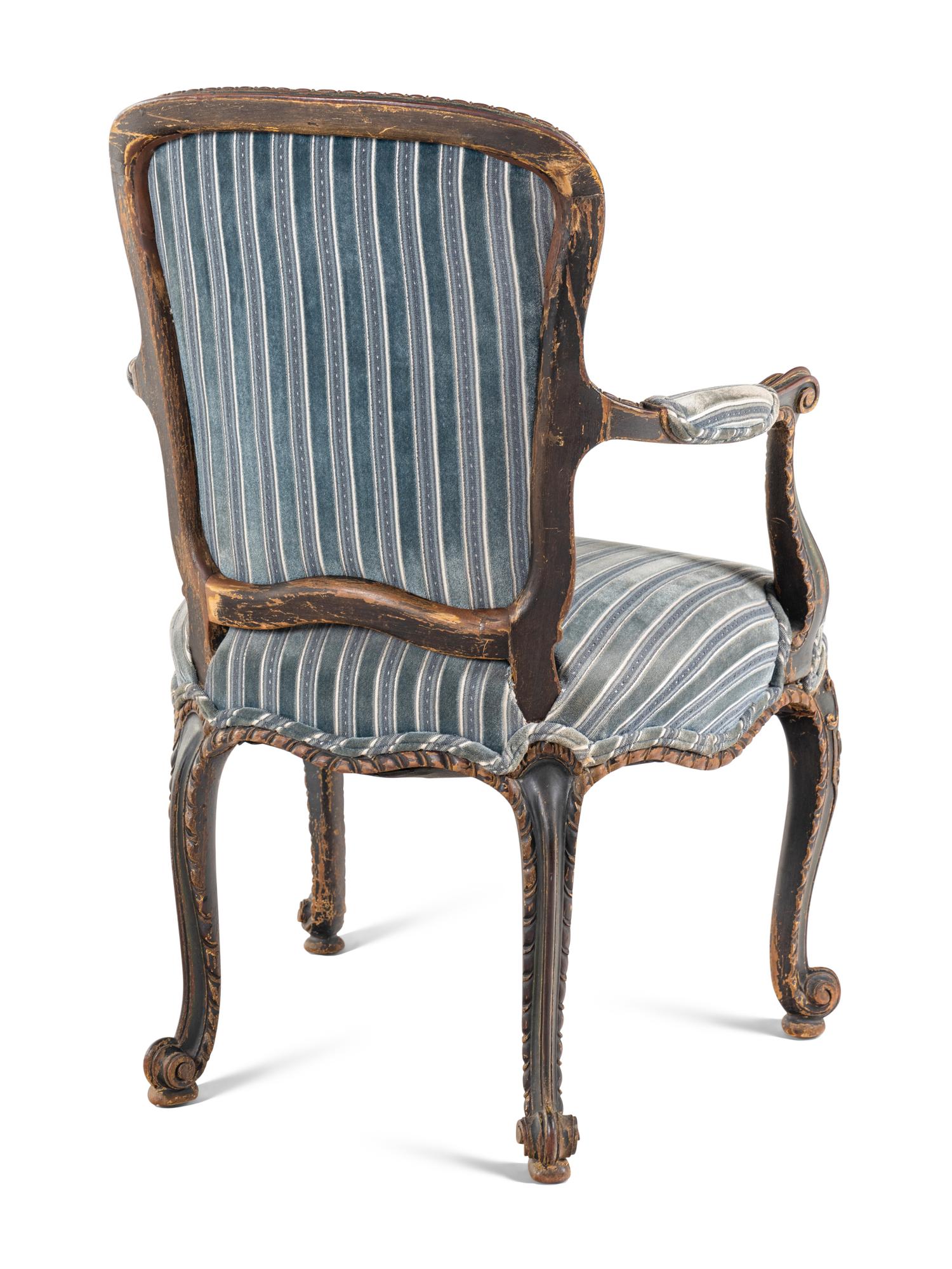 A George III Carved and Painted Mahogany Armchair