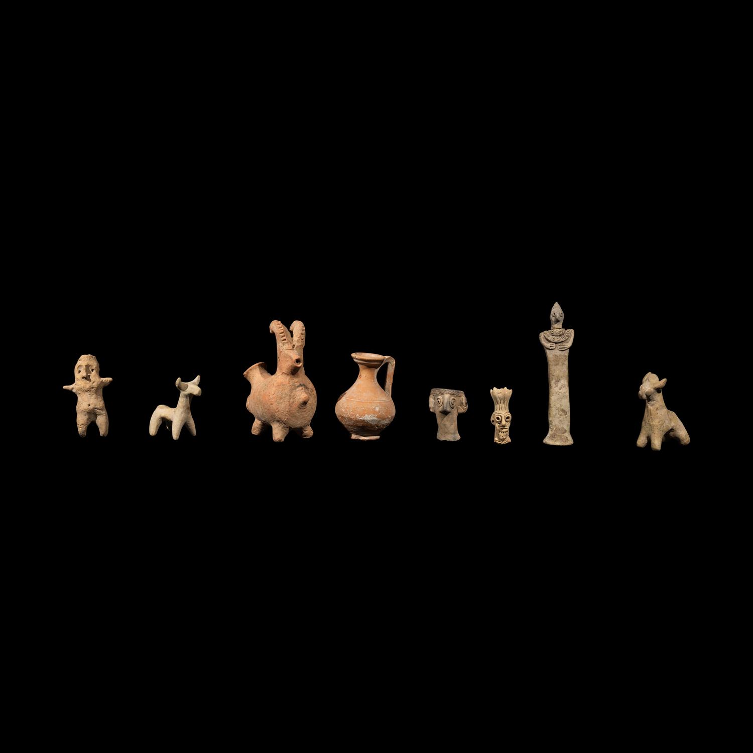 Eight Near Eastern Terracotta Figurines and Vessels