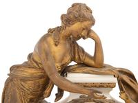 A French Gilt Bronze and Marble Clock Garniture