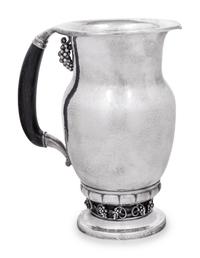 A Georg Jensen Silver Grape Pattern Pitcher
