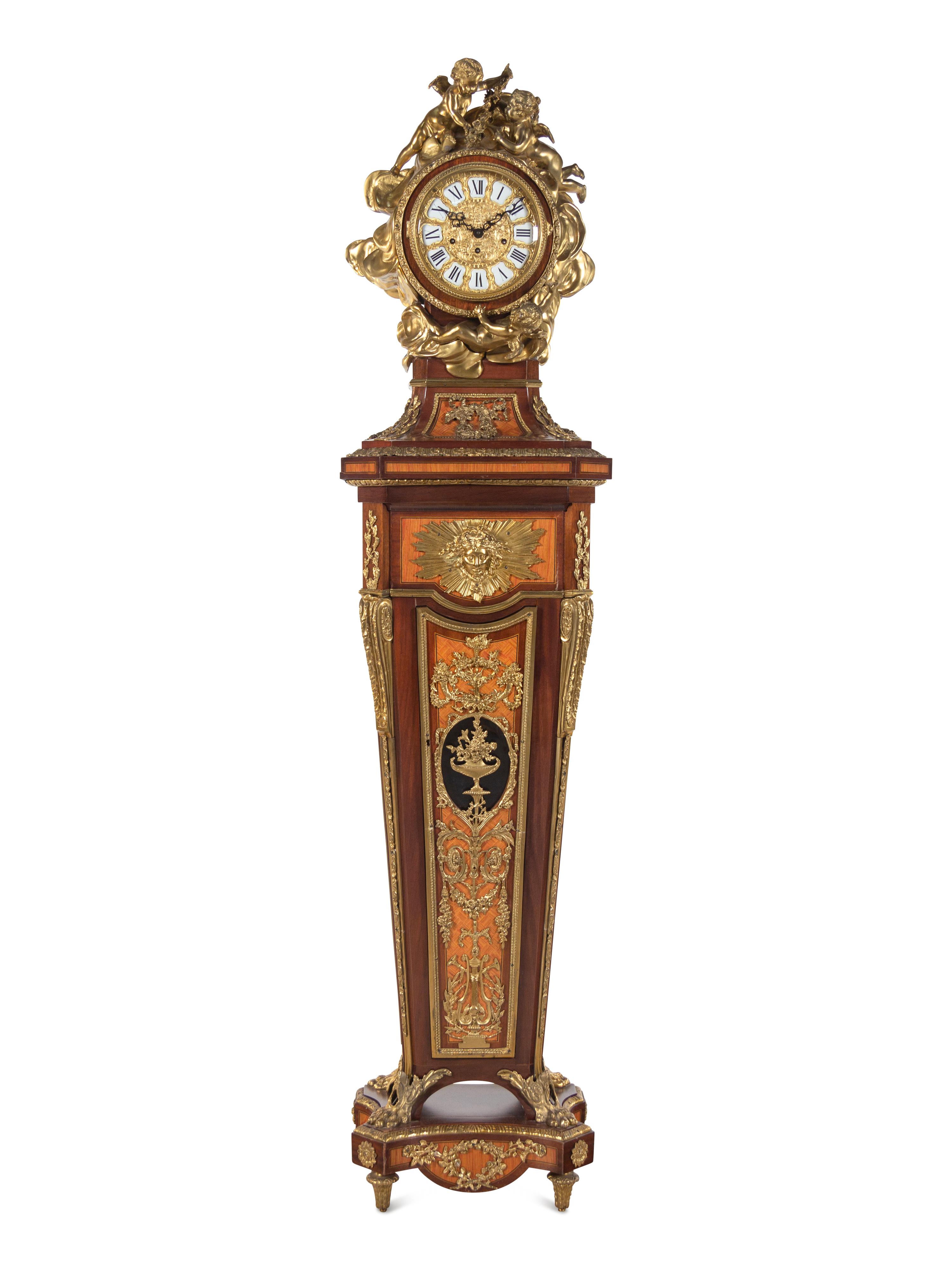 A Louis XVI Style Gilt Bronze Mounted Parquetry and Mahogany Régulateur de Pendule