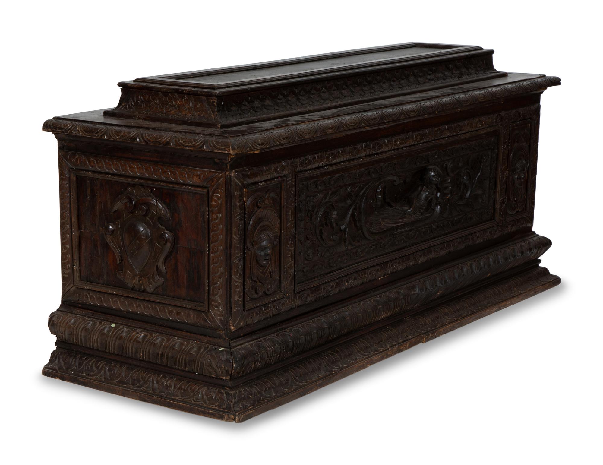An Italian Renaissance Revival Carved Oak Cassone