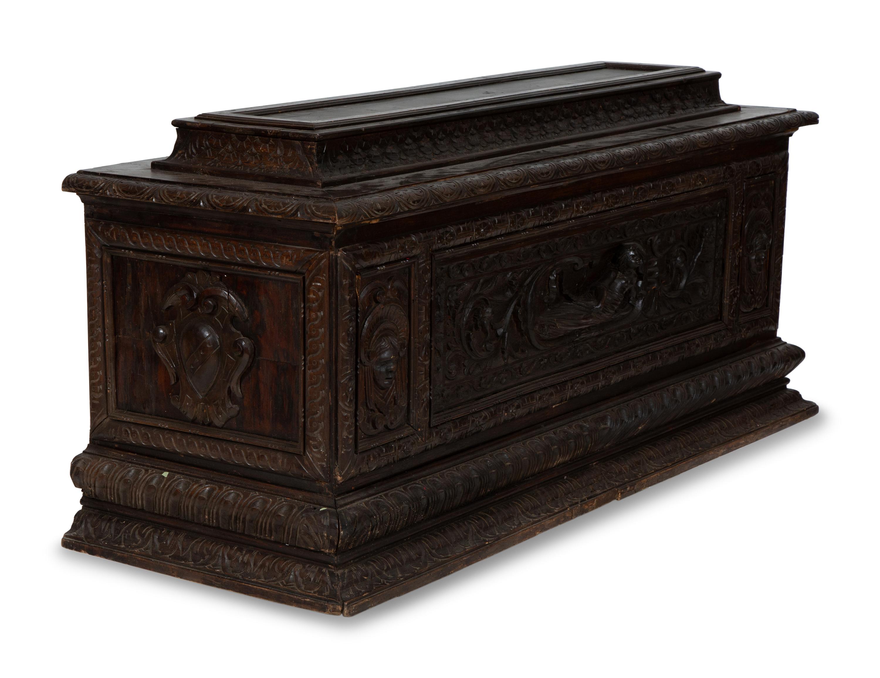 An Italian Renaissance Revival Carved Oak Cassone