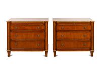 A Pair of Continental Parcel Gilt Walnut Bedside Cabinets