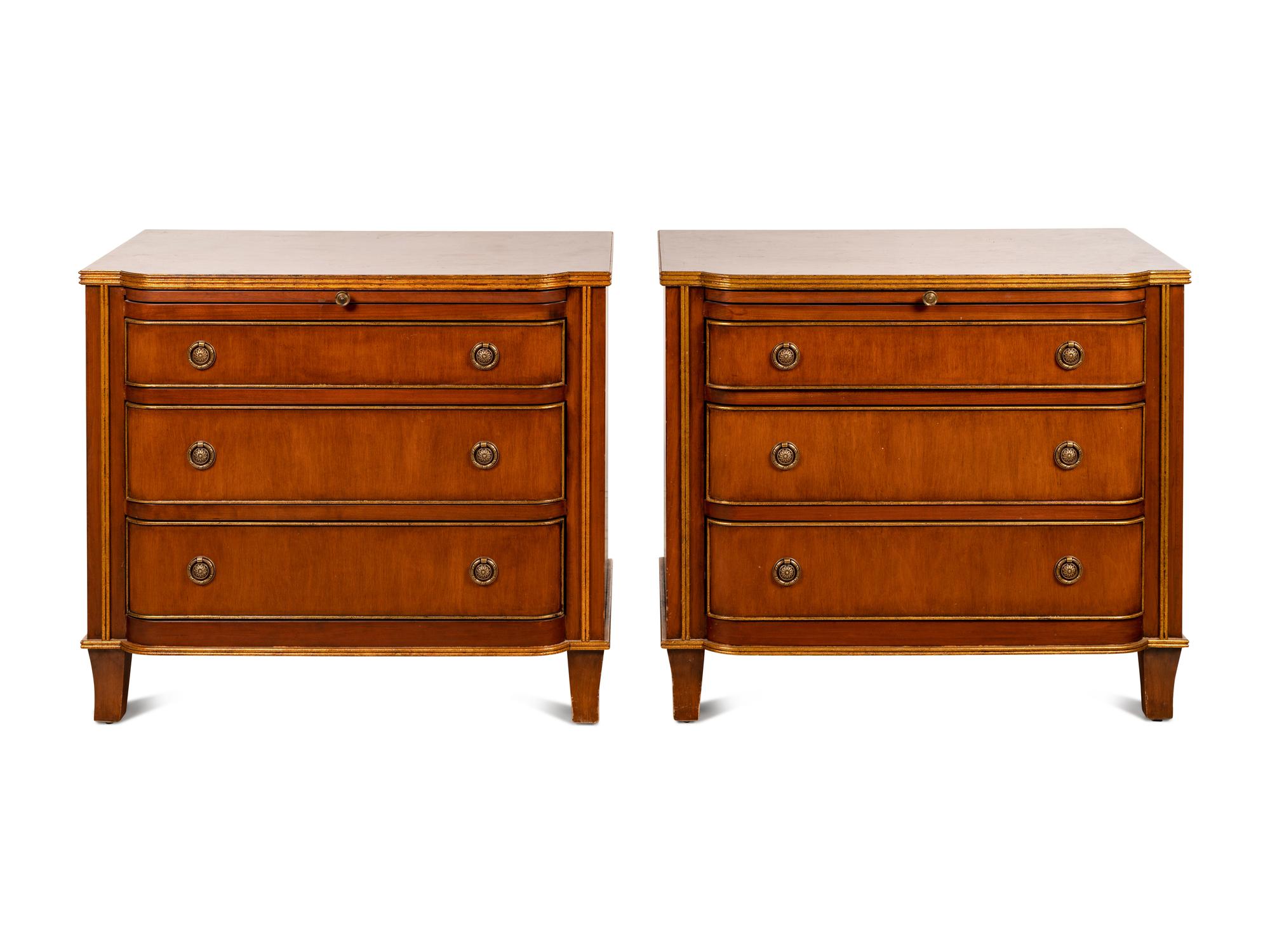 A Pair of Continental Parcel Gilt Walnut Bedside Cabinets