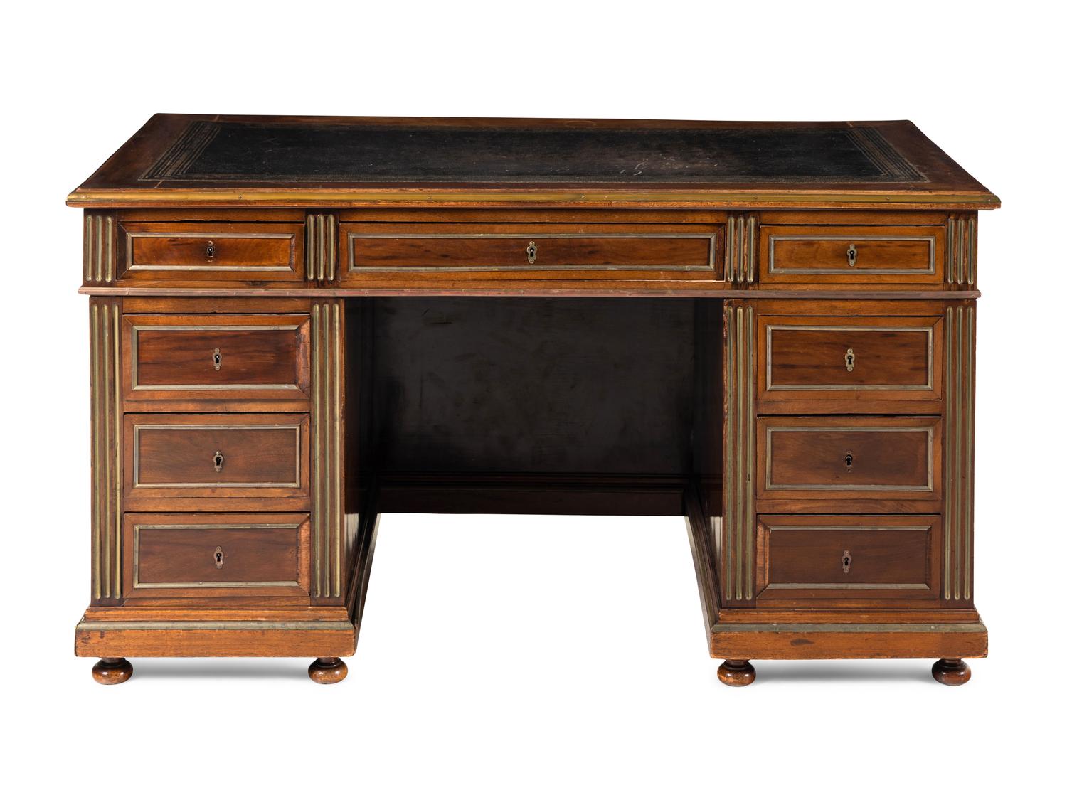 A Directoire Style Brass Mounted Mahogany Pedestal Desk