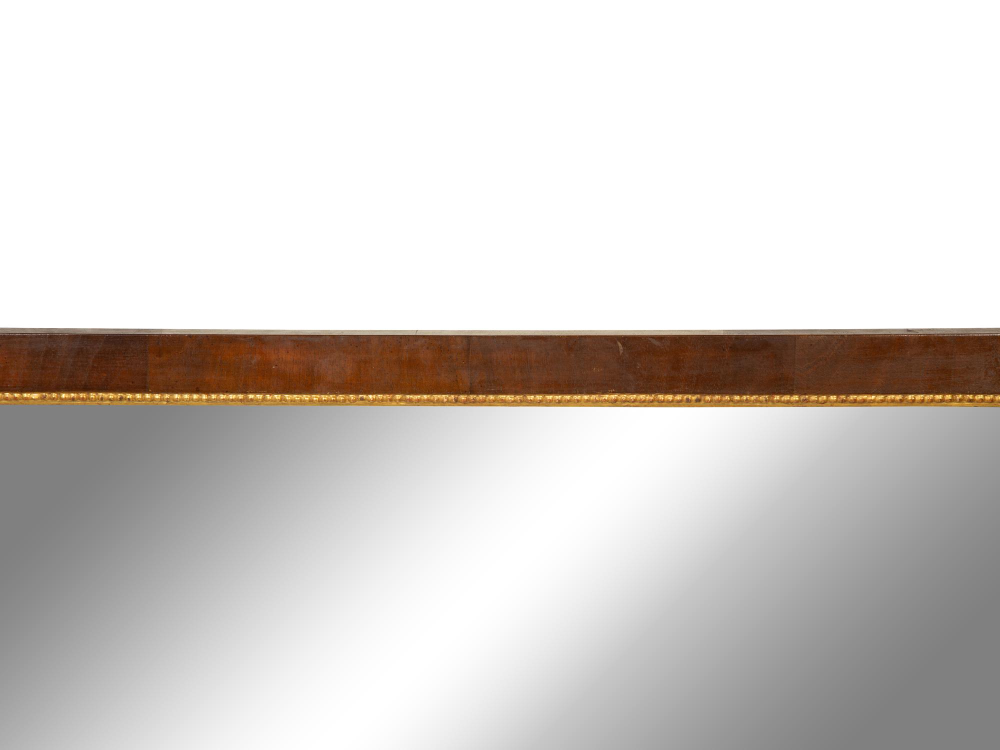 An Italian Neoclassical Style Giltwood and Mahogany Mirror