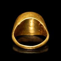 A Hellenistic Gold and Garnet Finger Ring with the God Eros