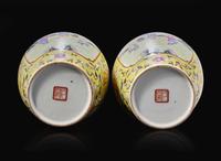 A pair of Chinese famille rose decorated yellow-ground “Boys” vases, 20th Century 黃地粉彩嬰戲盌一對 二十世紀