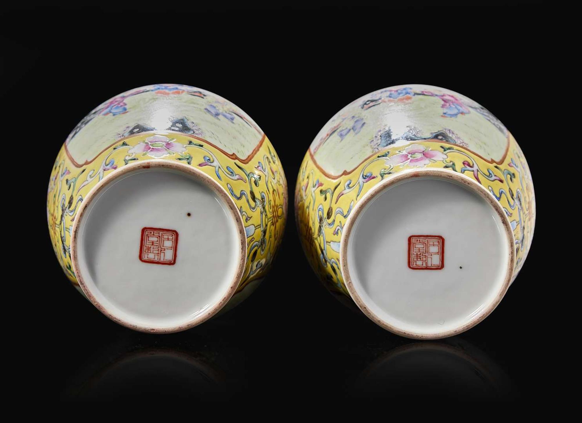 A pair of Chinese famille rose decorated yellow-ground “Boys” vases, 20th Century 黃地粉彩嬰戲盌一對 二十世紀