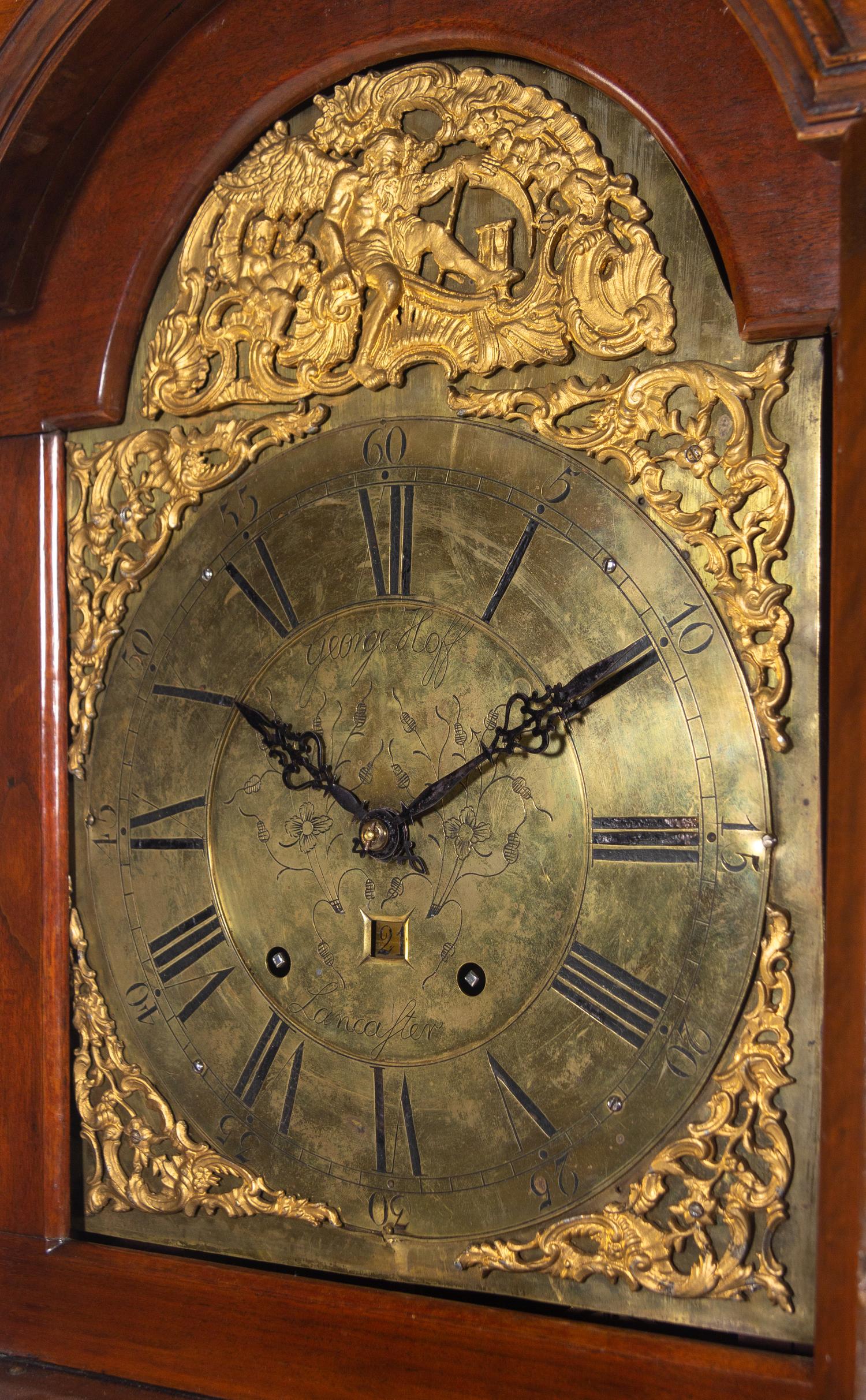 A Queen Anne Walnut Tall Case Clock