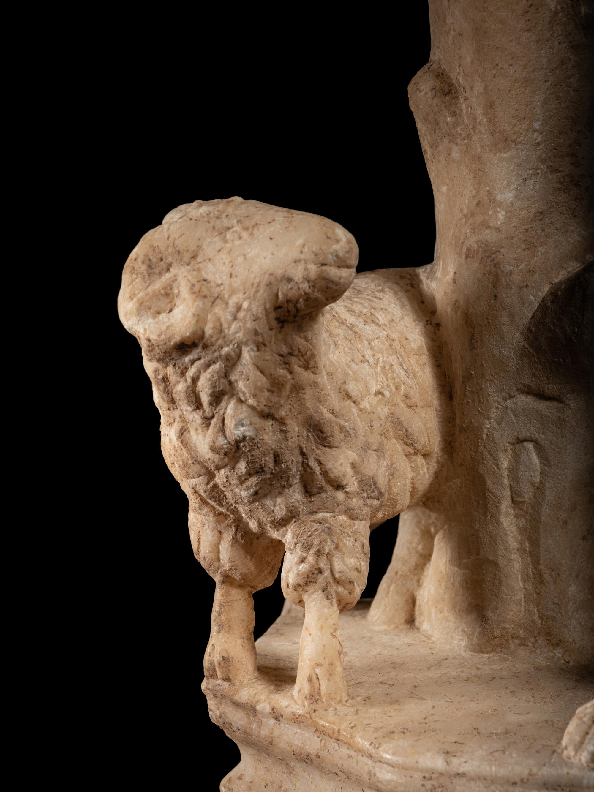 A Roman Marble Sculpture Base with a Ram