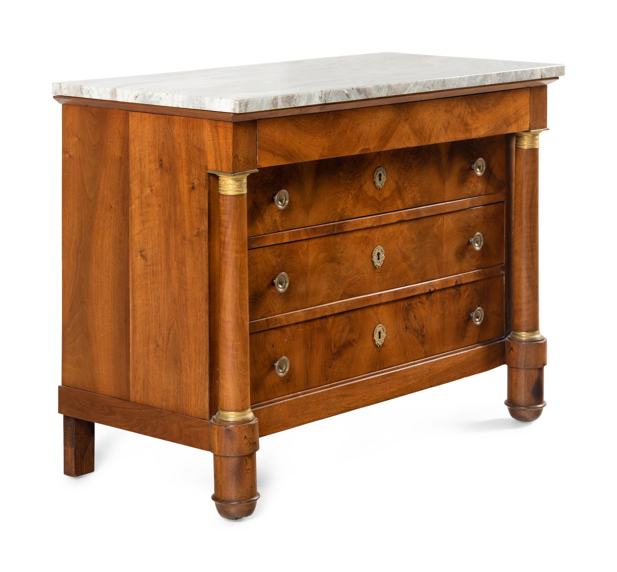 An Empire Gilt Bronze Mounted Walnut Marble-Top Commode